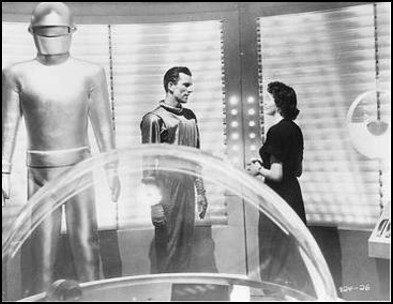 (L to R) Lock Martin as "Gort", Michael Rennie as "Klaatu" aka "Mr. Carpenter", Patricia Neal as "Helen Benson"